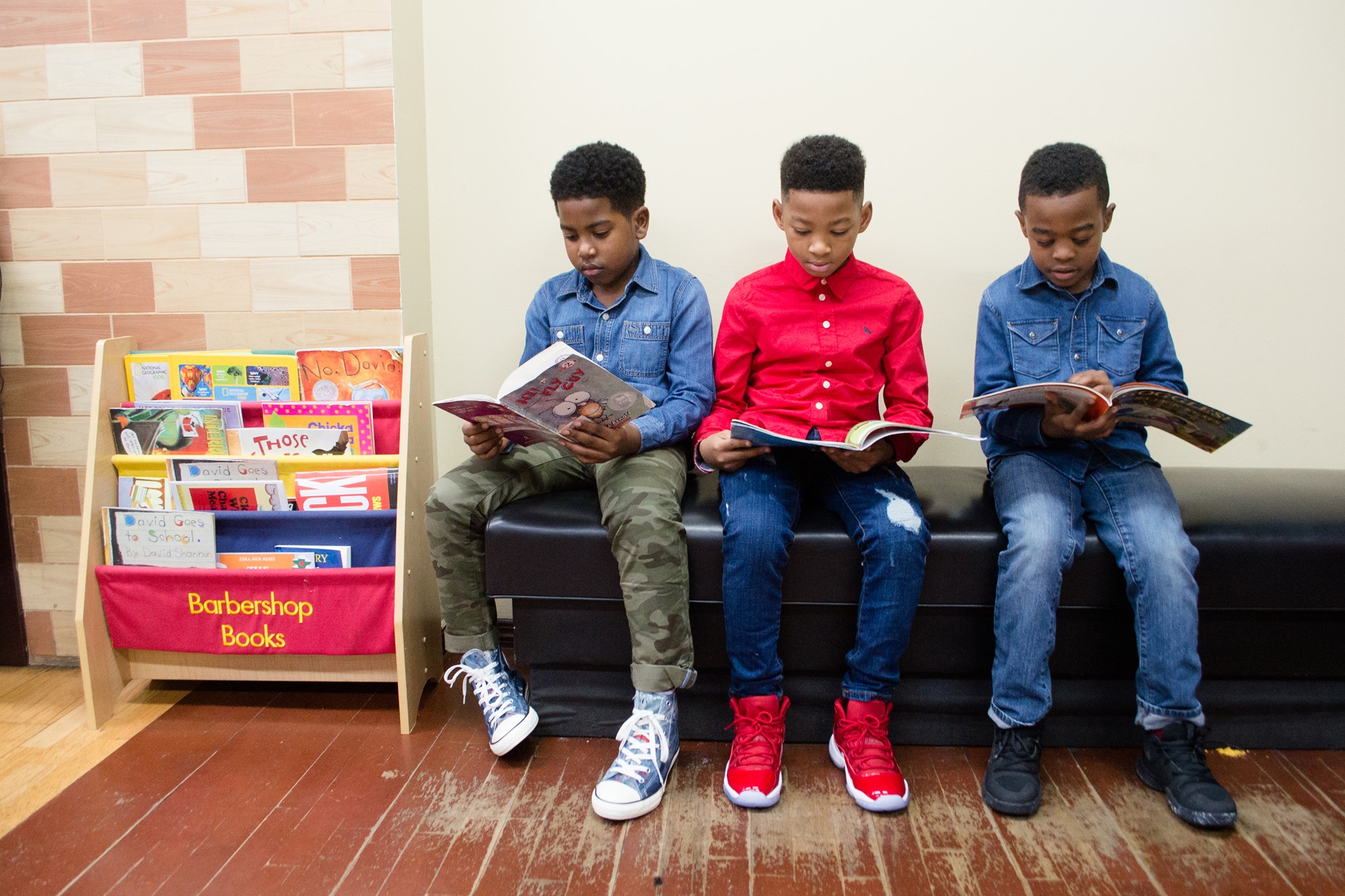 How Barbershop Books is transforming Black boys’ reading experiences and leveraging the untapped potential of barbershops across America